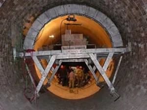 Bricking machine operator working in cement kiln