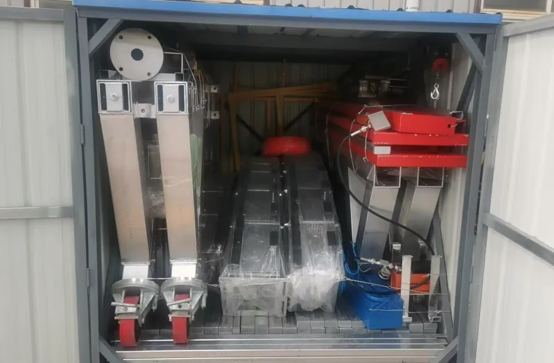 Bricklaying machine packed in a steel shipping crate